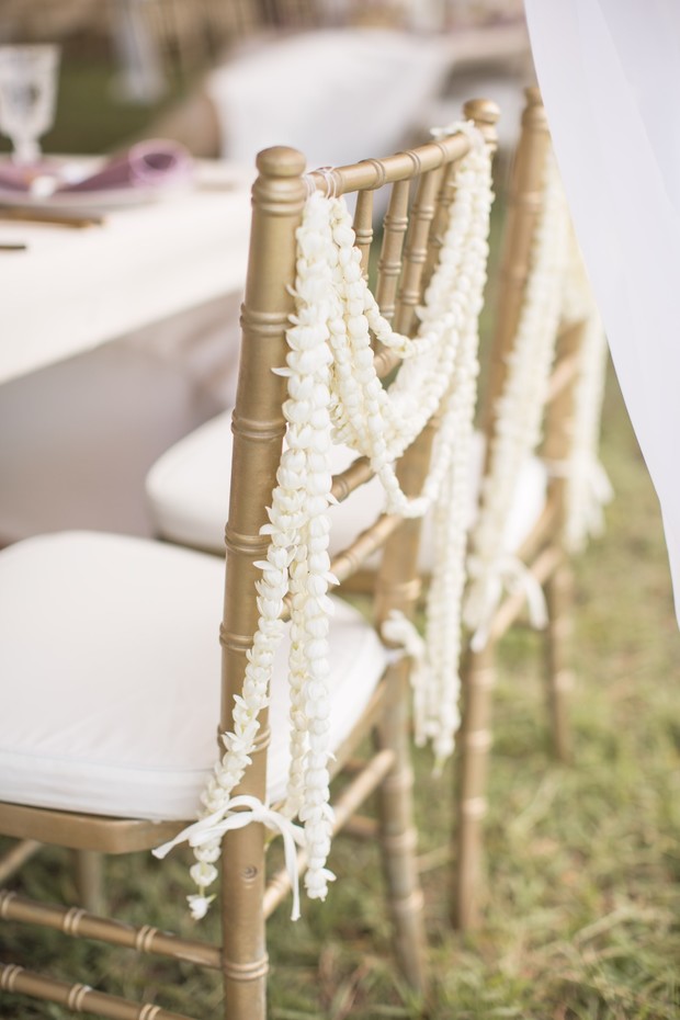 simple flower chain draped seat decor