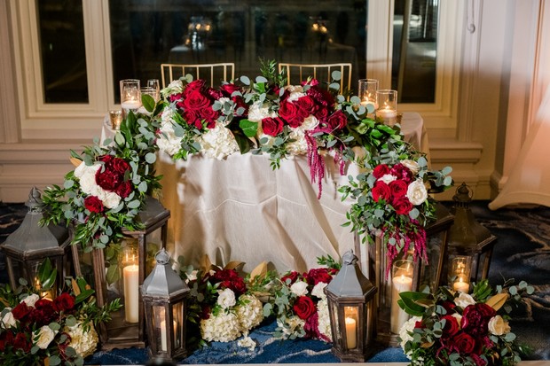 gold and burgundy sweetheart table