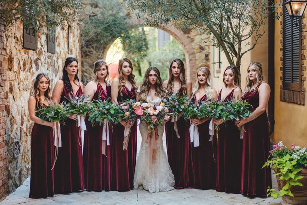 bridesmaids in red velvet dresses