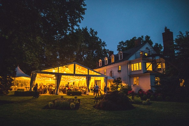 magically lit tented wedding reception