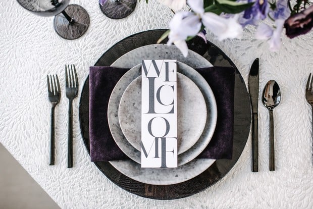 modern concrete grey and deep purple wedding table setting