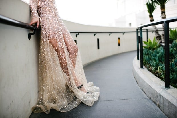 sheer wedding dress with lots of sequins