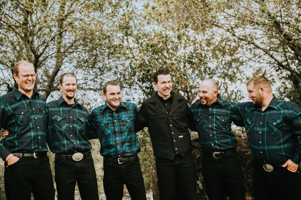 groom and groomsmen in rustic flannel