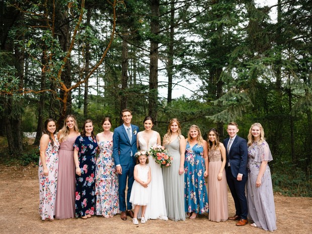 bridal party in mismatched floral dresses