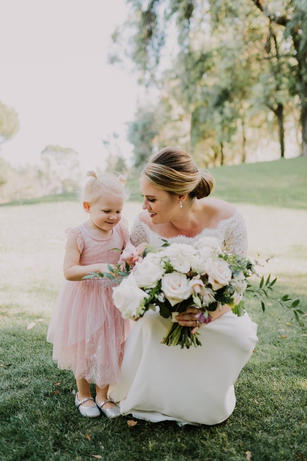 bride and pink flower girl