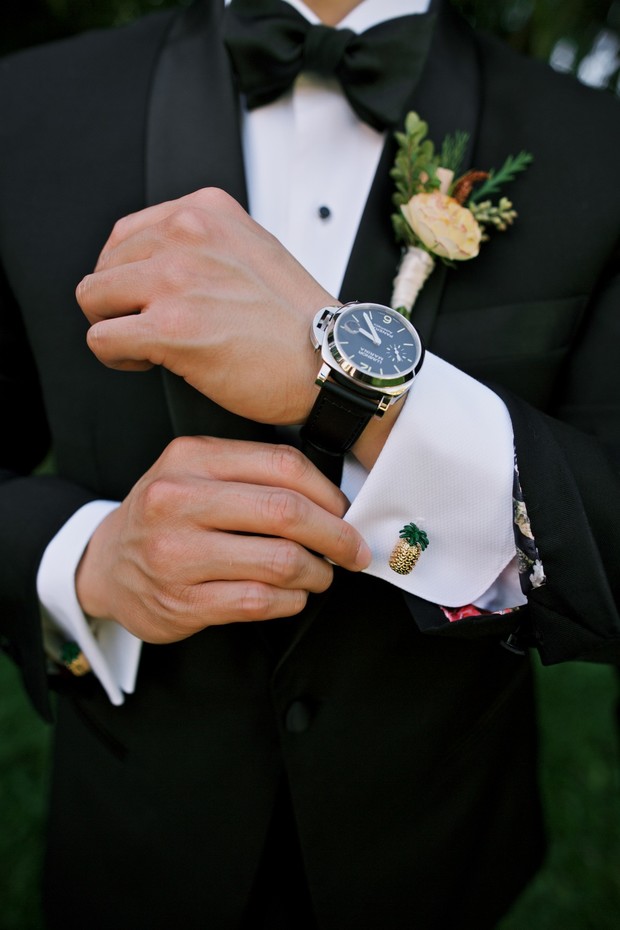 groom with pineapple cufflinks