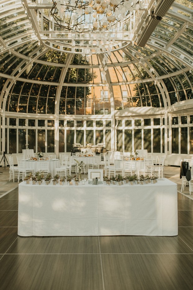Elegant wedding reception in a glass conservatory venue