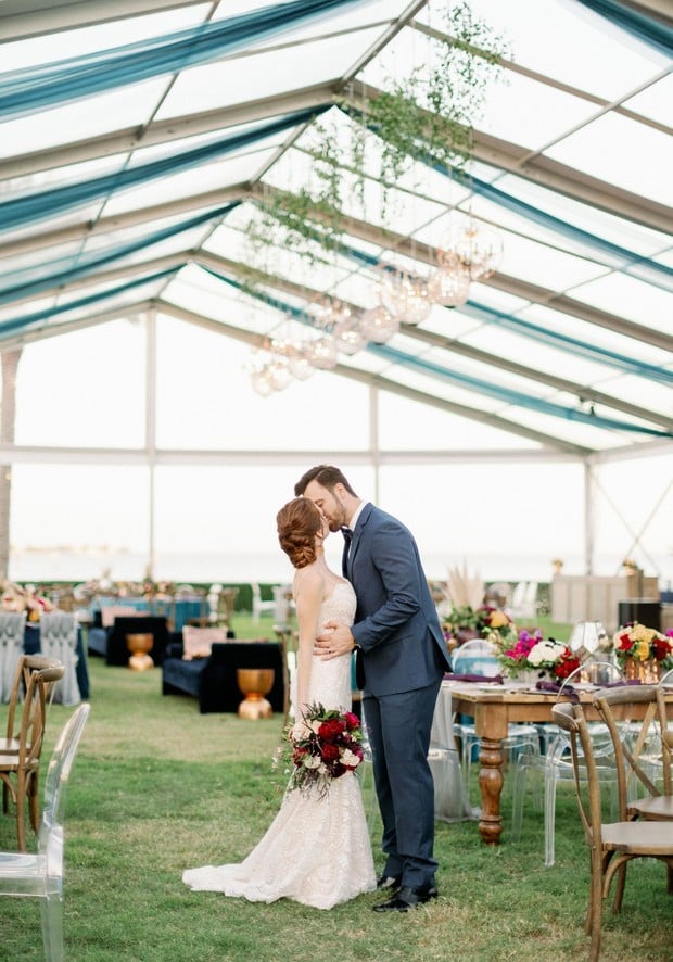 tent wedding reception in jewel tones