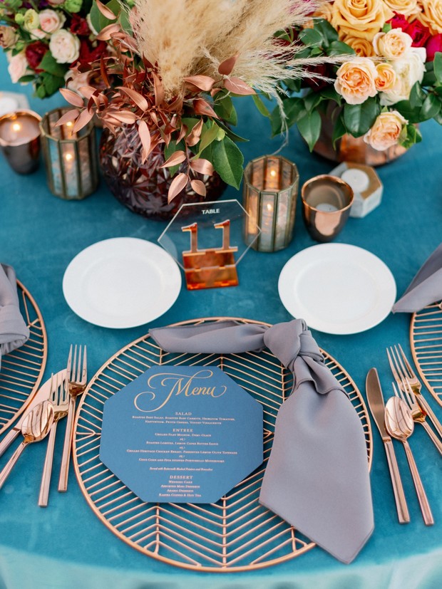 blue and copper reception table decor