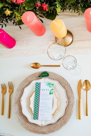gold and white tropical wedding place setting