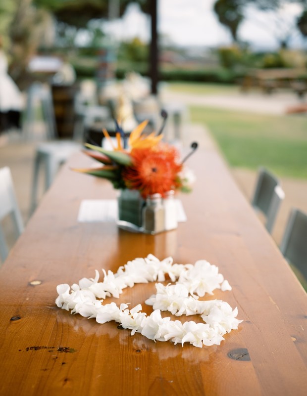 tropical flower and flower lei table decor