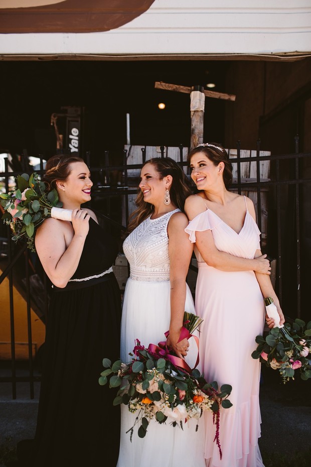 bridal party in black and pink