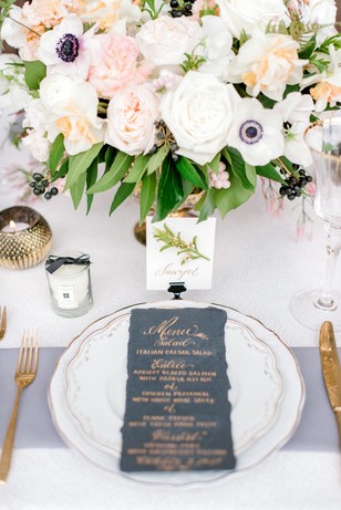 gold and white wedding table setting