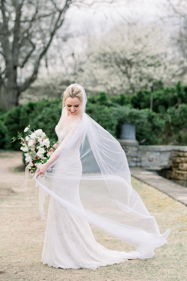 bride in a beautiful dress from Blue by Enzoani