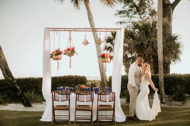 wedding table with boho hanging floral decor