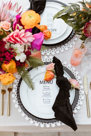 gold and funky wedding place setting for a summer wedding