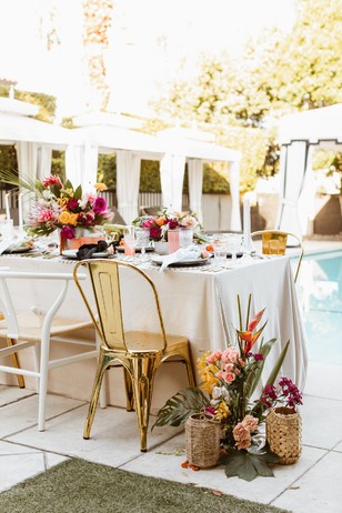 bright and bold tropical poolside wedding reception