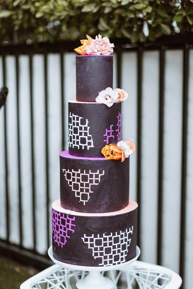 Black orange and purple wedding cake