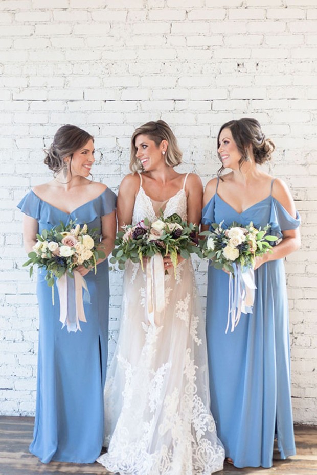 bride and her bridesmaids in blue