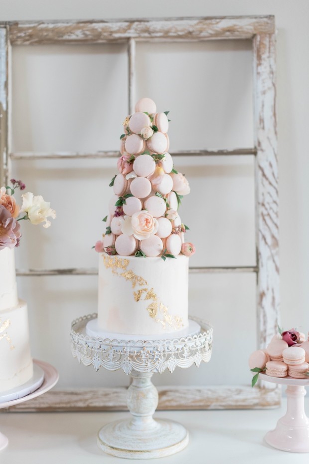 blush macaron topped wedding cake