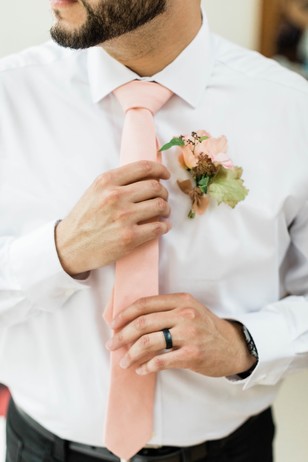 groom in blush tie