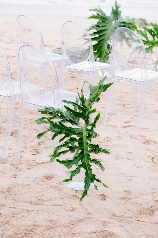 beach wedding decor with ghost chairs