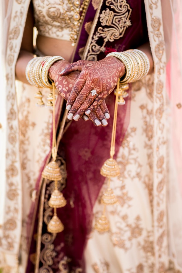 traditional bridal look with henna hands