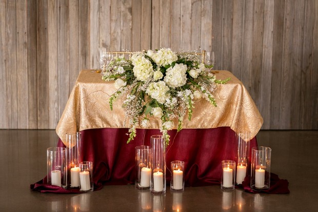 gold and burgundy sweetheart table