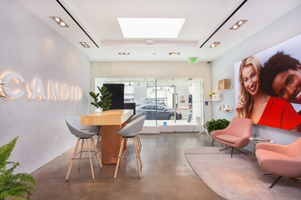 Candid store interior waiting area with smiling faces