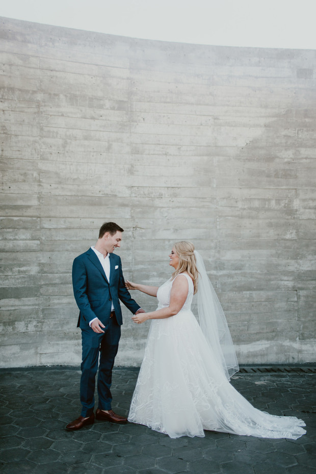 Newlyweds share a loving look on their wedding day