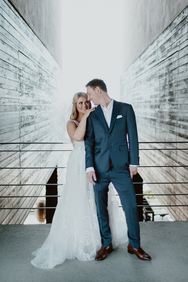 Bride and groom at modern architecture wedding venue