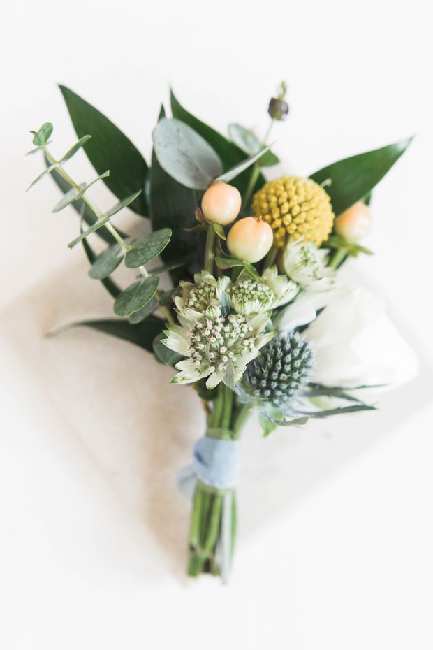 Elegant small wedding bouquet with green and yellow flowers