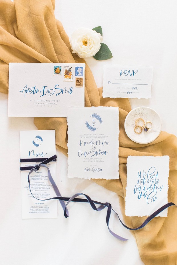 Elegant wedding stationery suite with blue calligraphy