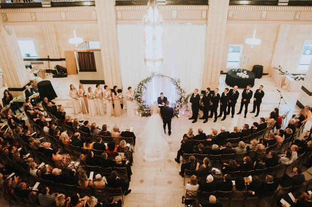 Overhead view of elegant wedding ceremony in a grand hall