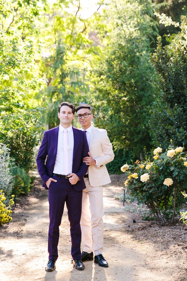 grooms in purple and ivory