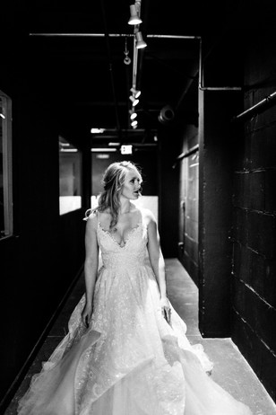 Black and white portrait of bride in wedding dress