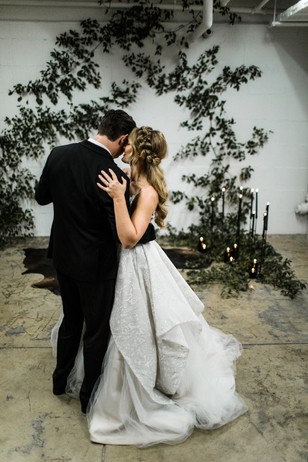 Bride and groom dancing at their elegant wedding venue