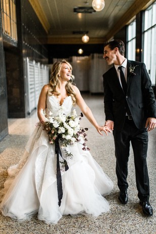 Bride and groom share loving glance on wedding day