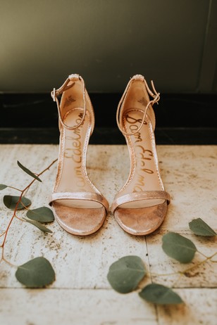 Elegant Sam Edelman rose gold bridal heels with greenery