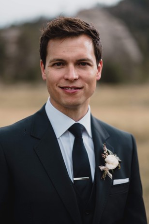 groom in modern suit