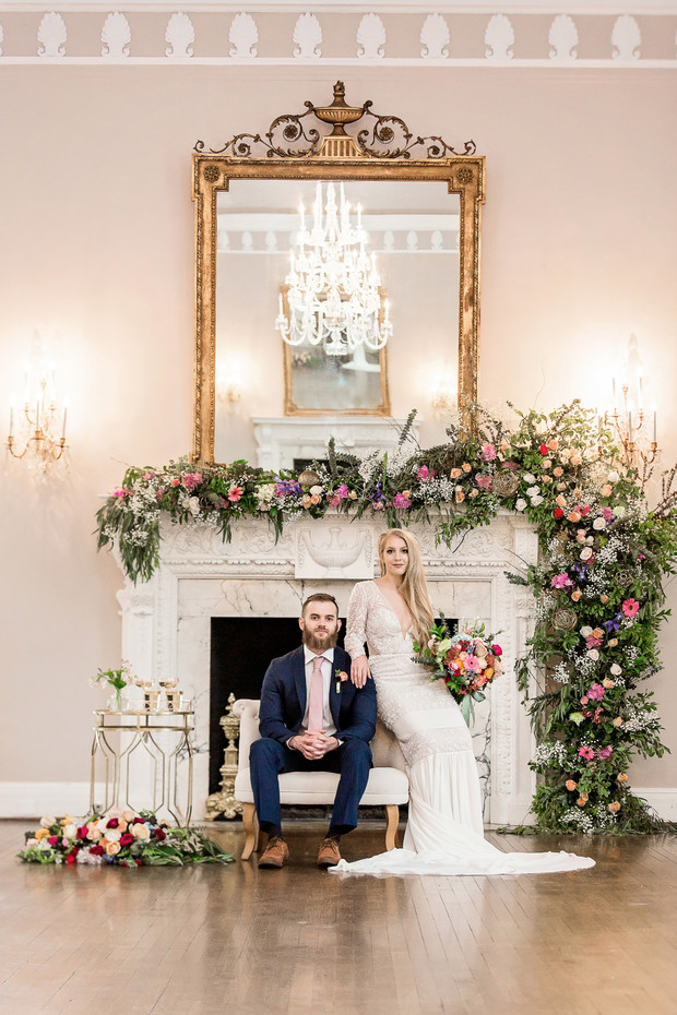 Bride and groom pose for wedding photo