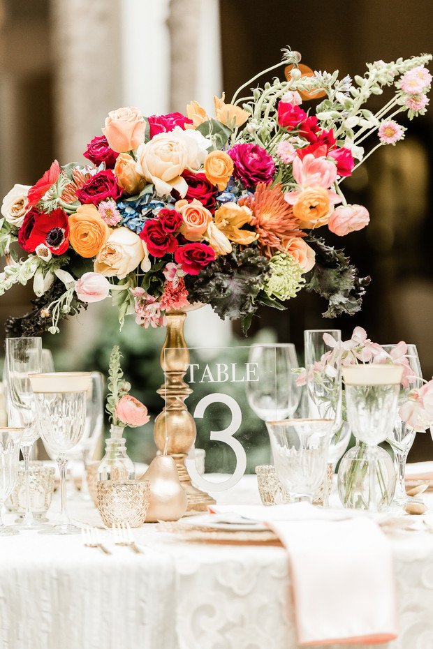 Wedding table centerpiece with colorful floral arrangement