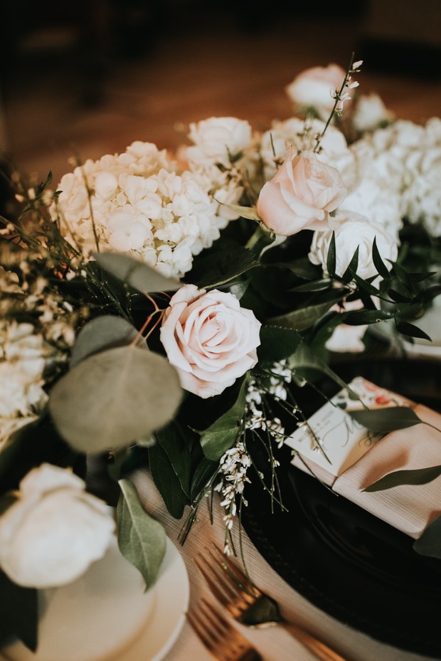 Romantic floral centerpiece with roses and hydrangeas