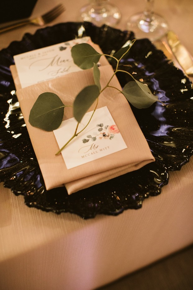 Elegant wedding table setting with eucalyptus decor