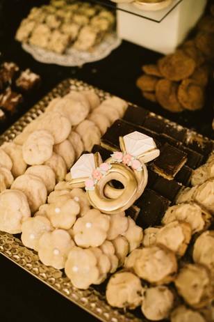 Elegant dessert tray with ring cookies and chocolate brownies