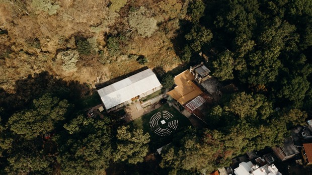 Aerial view of a secluded venue with outdoor seating