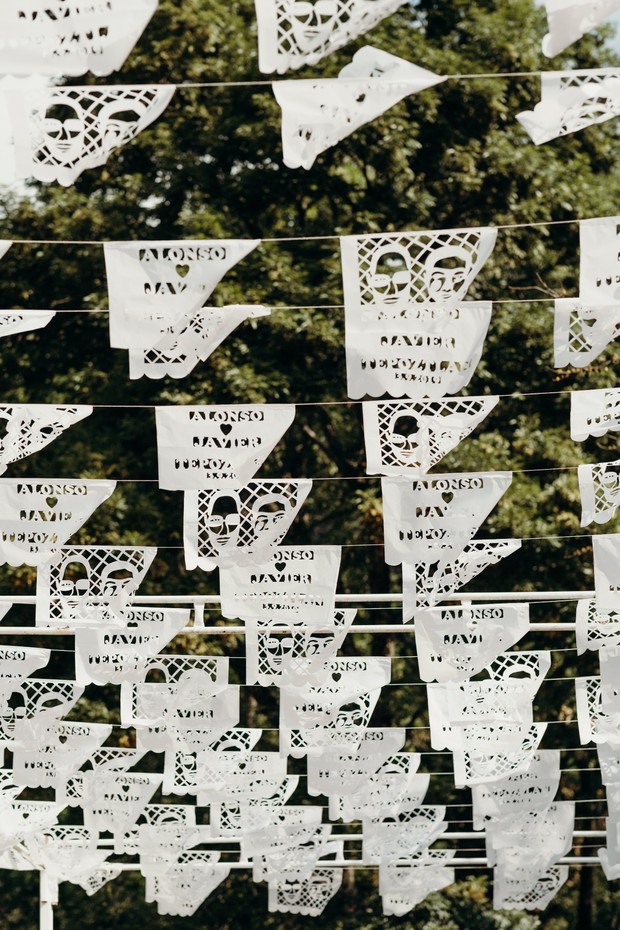 White paper banners with skull designs for Day of the Dead