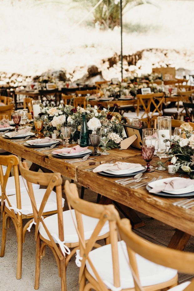Elegant wedding reception table setting with floral decor