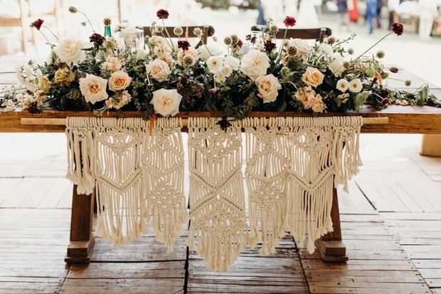 Rustic wedding table decor macrame runner and flowers