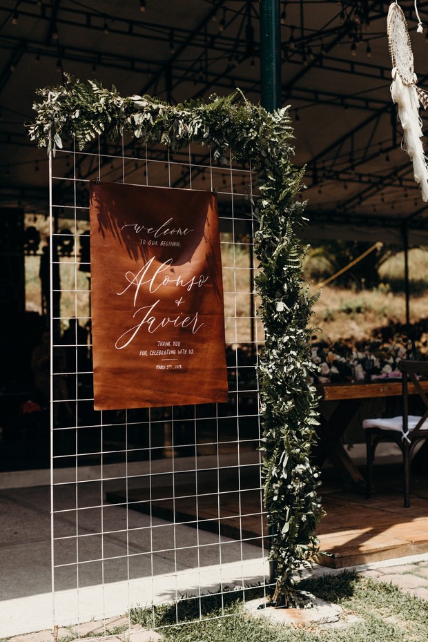 Elegant wedding welcome sign for Alonso and Javier